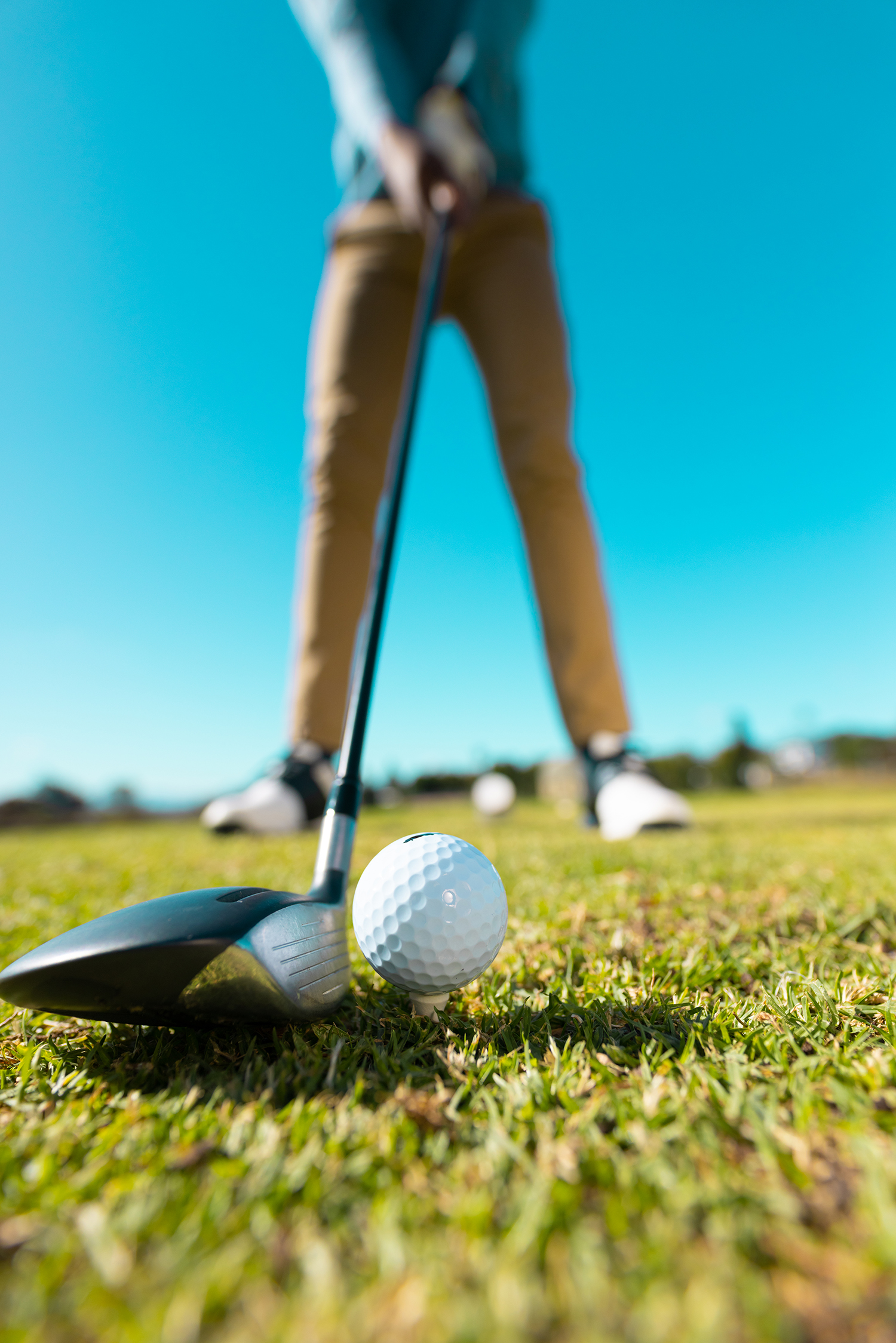 Golfer beim Abschlag
